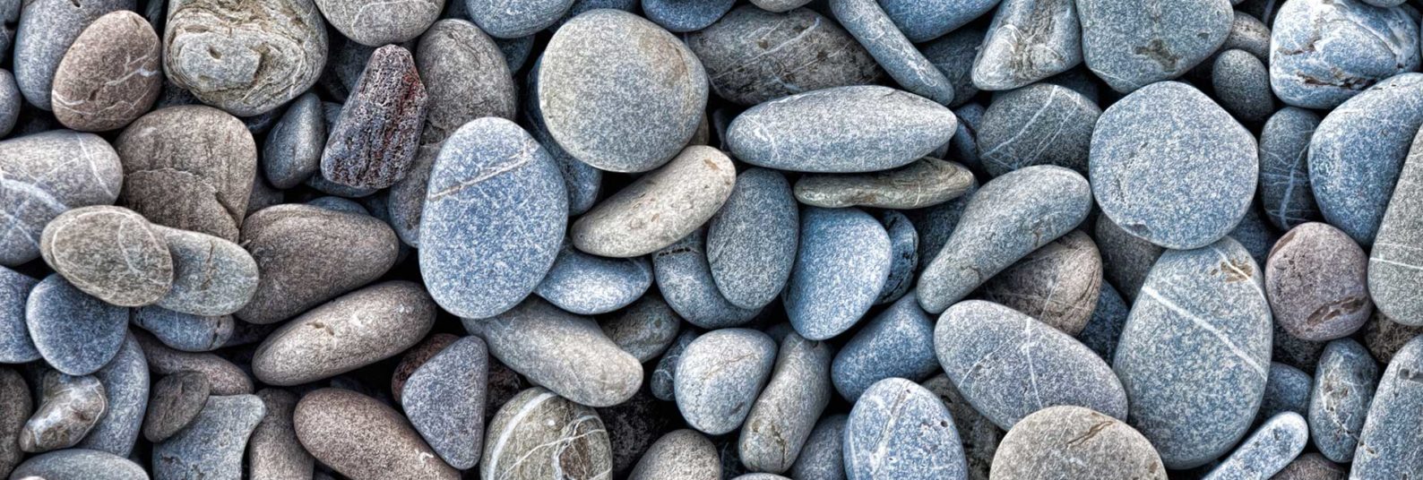 a collection of beach rocks and pebbles