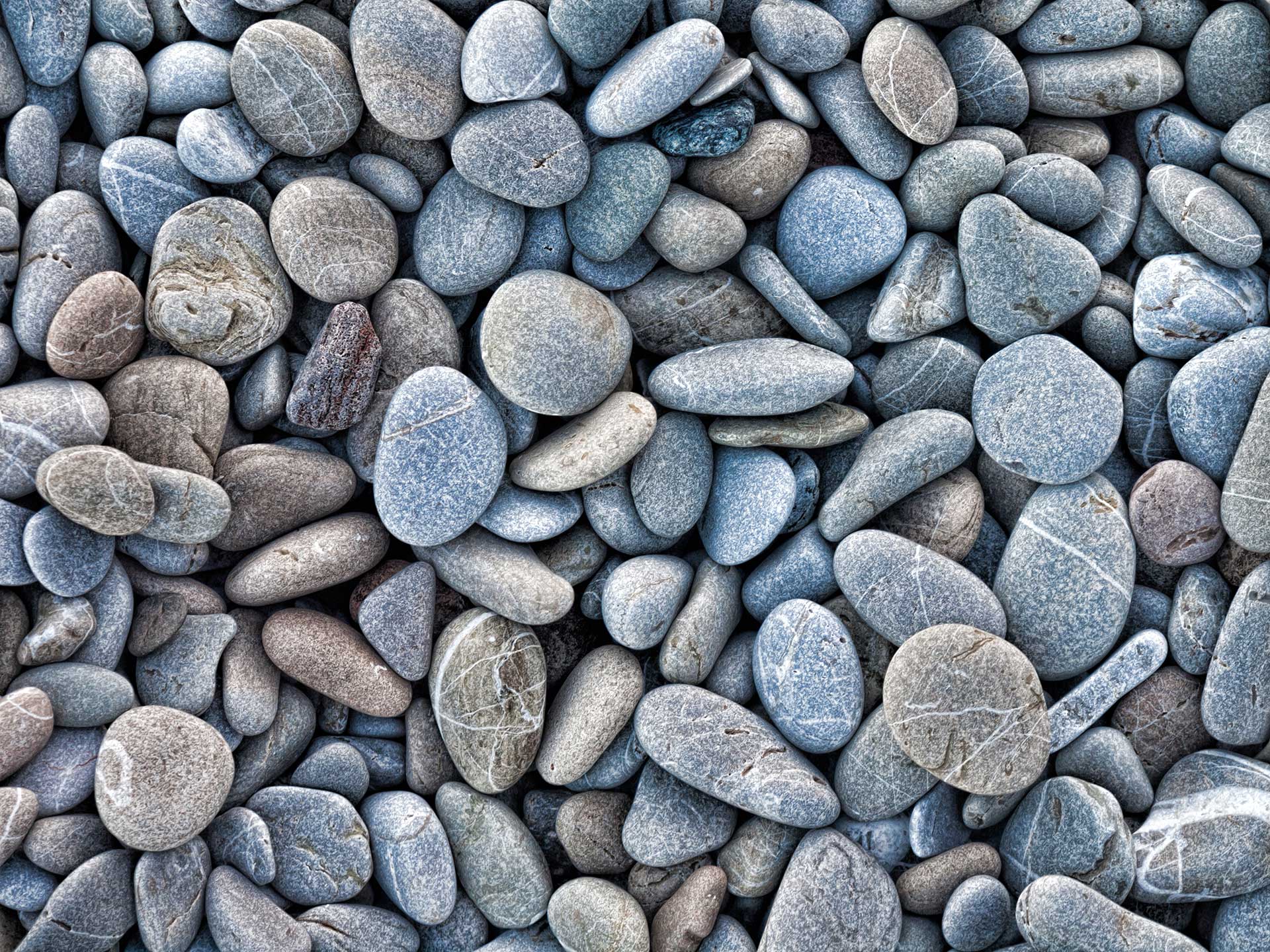 a collection of beach rocks and pebbles